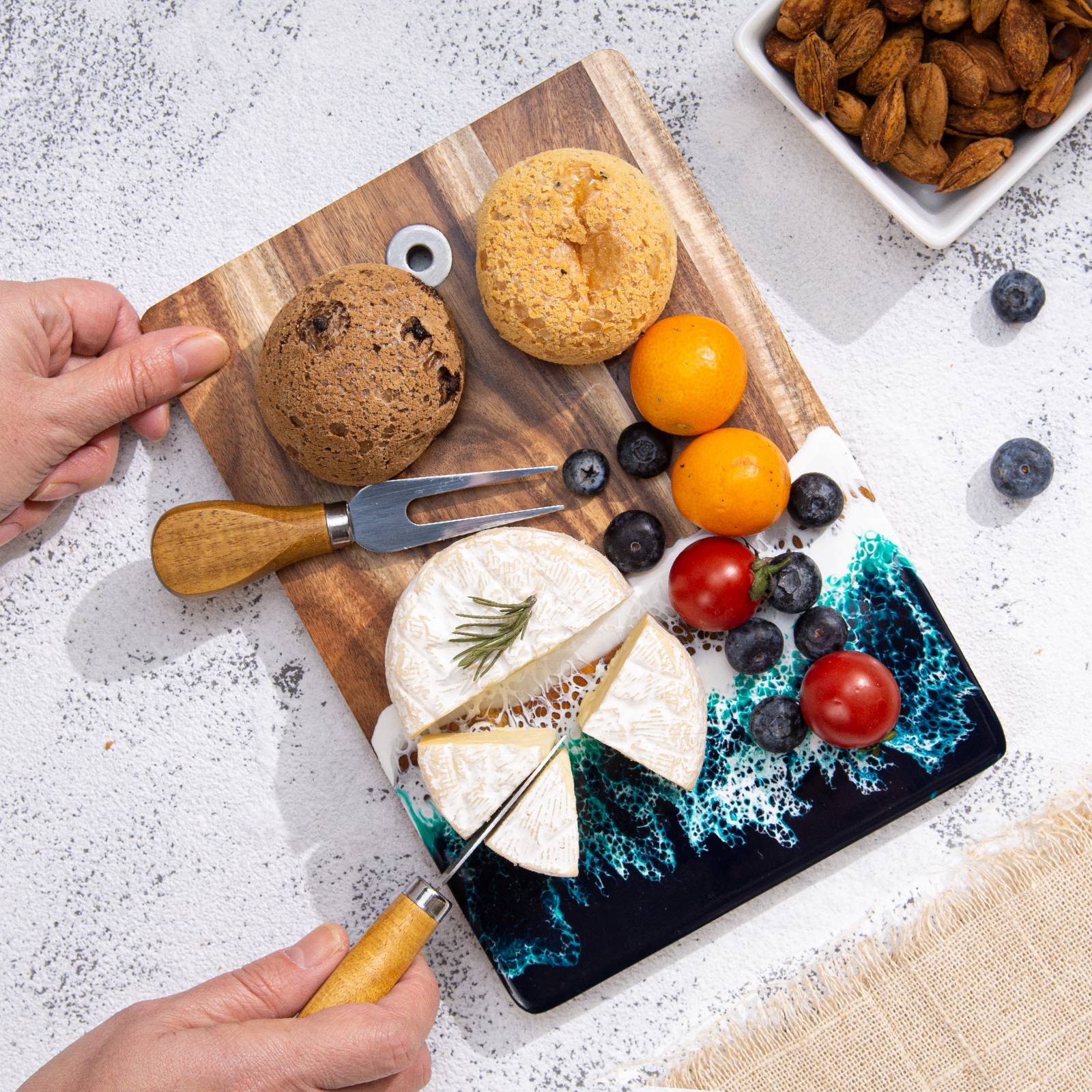 Acacia wood resin cutting board side view showing 9.6 inch size