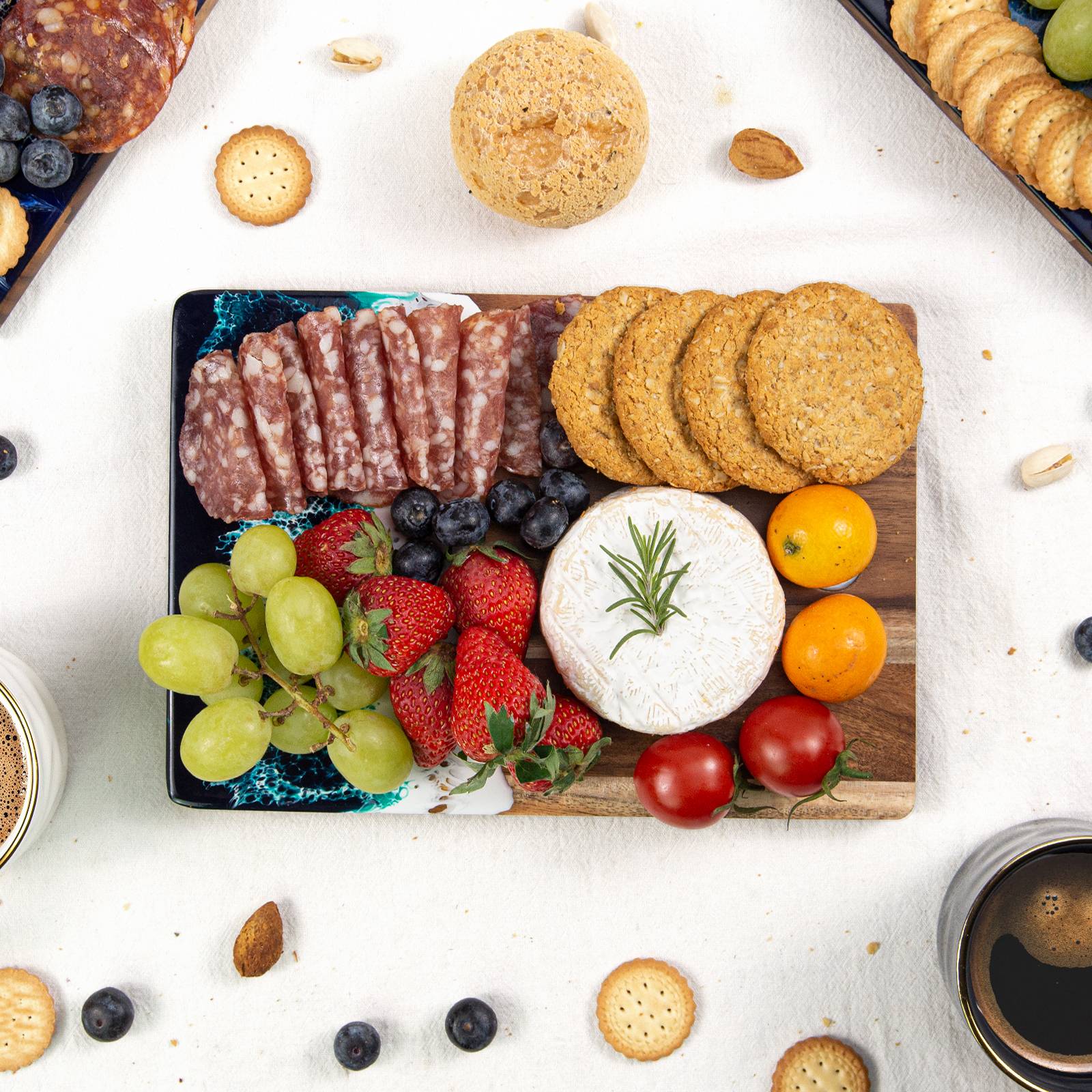 Small resin charcuterie board hanging on kitchen wall as decor
