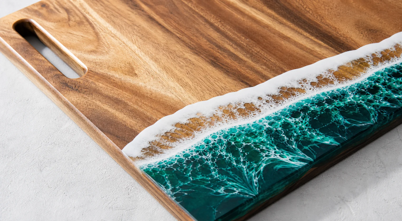 Close view of a real GOGOJSM acacia wood board and blue resin edge