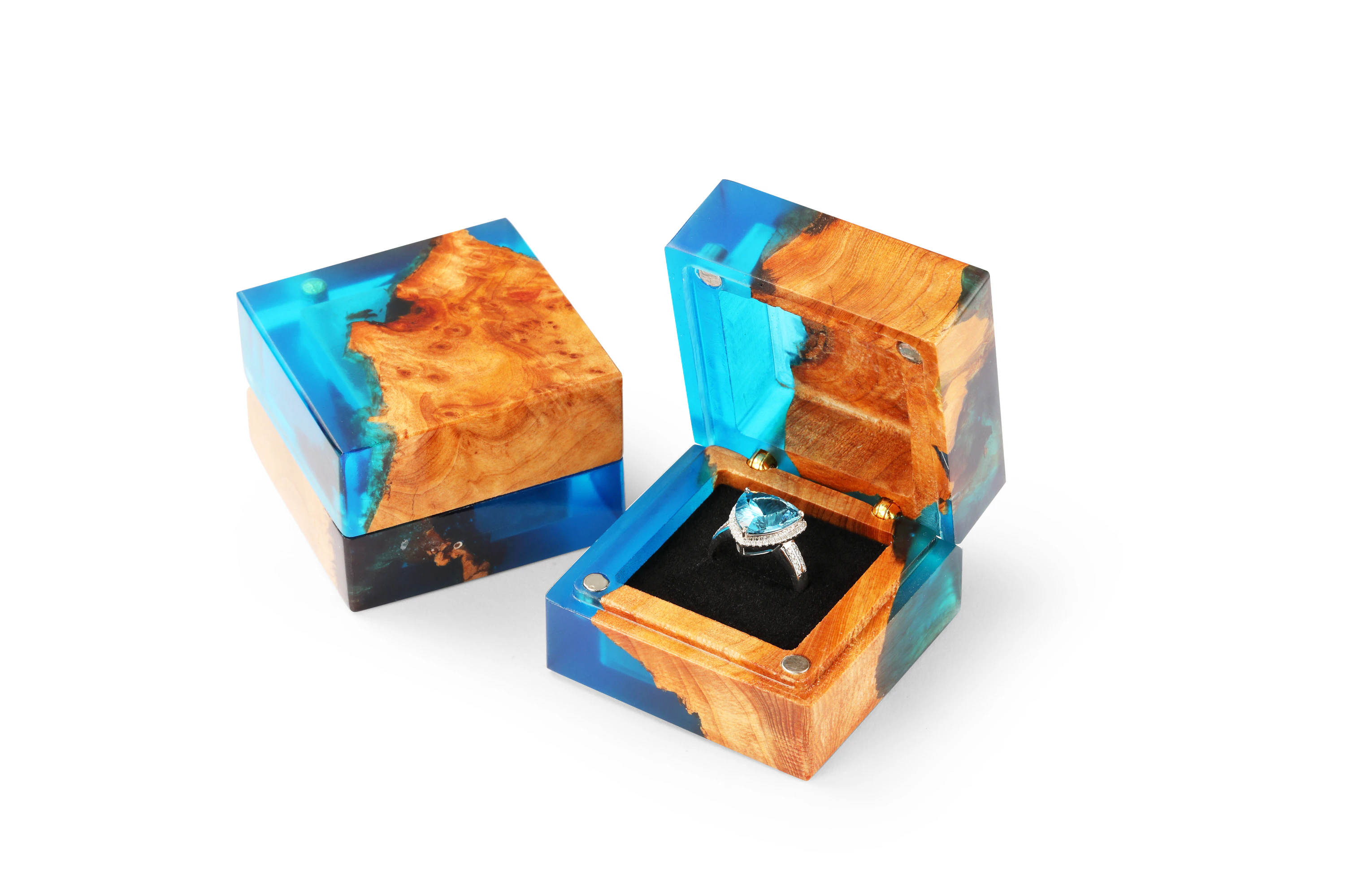 Deep blue handmade wood resin proposal ring box closed on a white background