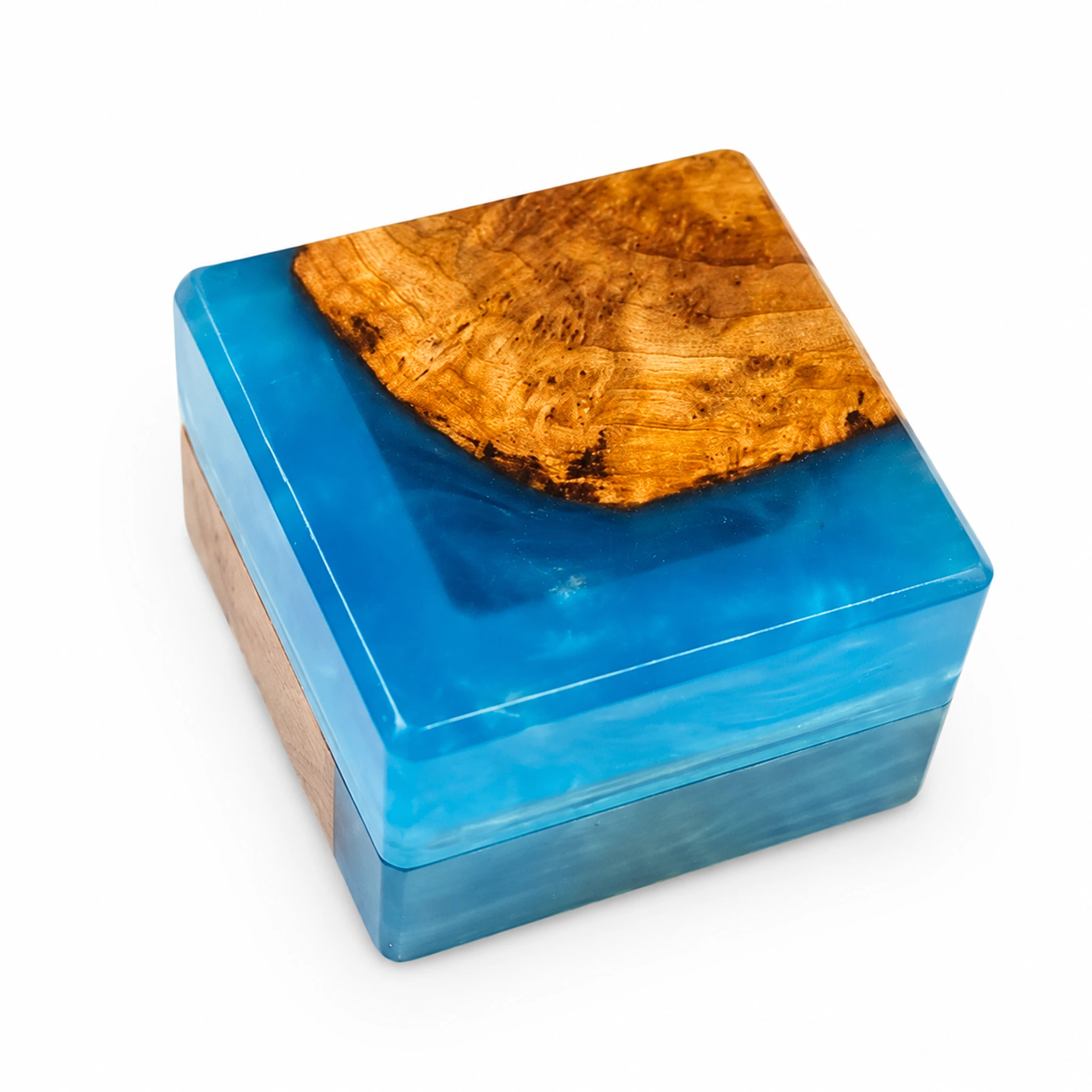 Light blue wood and resin proposal ring box closed on a white background